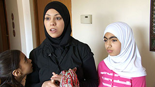 American Arab woman and daughter wearing their hijab