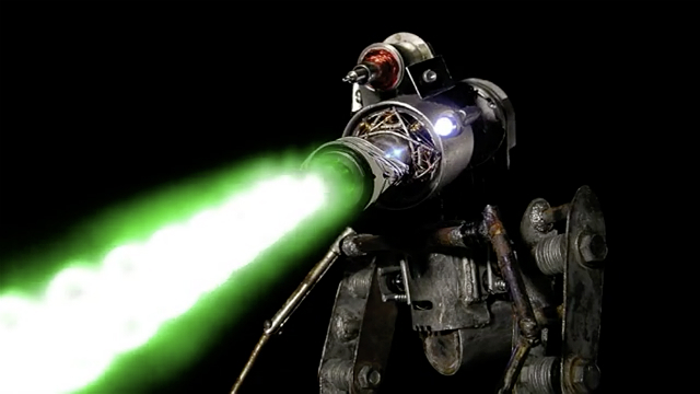 Giant robot shooting a green laser beam