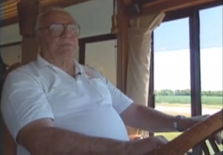 Ernest Borgnine drives his massive bus