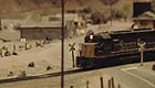 Closeup of a model train running its track