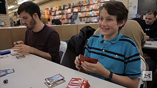 Teenage boy enjoys playing Magic the Gathering