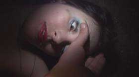 Passed out girl has her eyelid opened