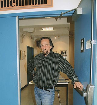 Howard Guttenplan standing in the doorway entrance to the Millennium Film Workshop