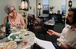 Martin Scorsese sitting at a table with his mother