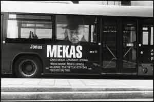 Jonas Mekas on Bus Bus with a photo of Jonas Mekas on the side