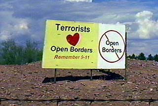 Sign that reads Terrorists (Heart) Open Borders