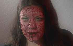 Girl with face covered in blood