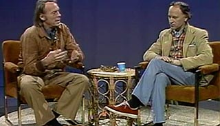 Jonas Mekas being interviewed by Robert Gardner on a public access TV show set