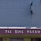 The Blue Macaw Exterior sign for The Blue Macaw