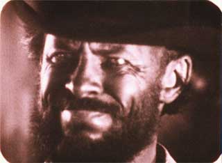 Film still from Quick Billy featuring Bruce Baillie as a cowboy