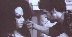 Van Smith and Divine Van Smith applies makeup to Divine's face on the set of Female Trouble